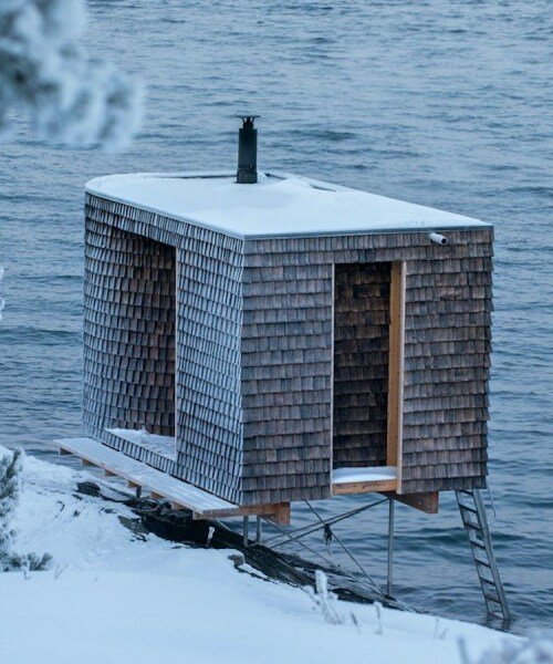oslo works' wooden sauna perched above norwegian shore invites remote relaxation